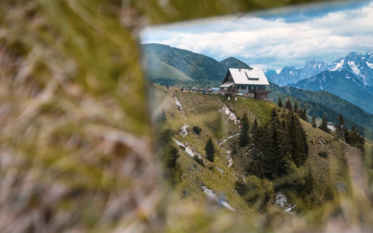 Mountain hut Golica in mirror
