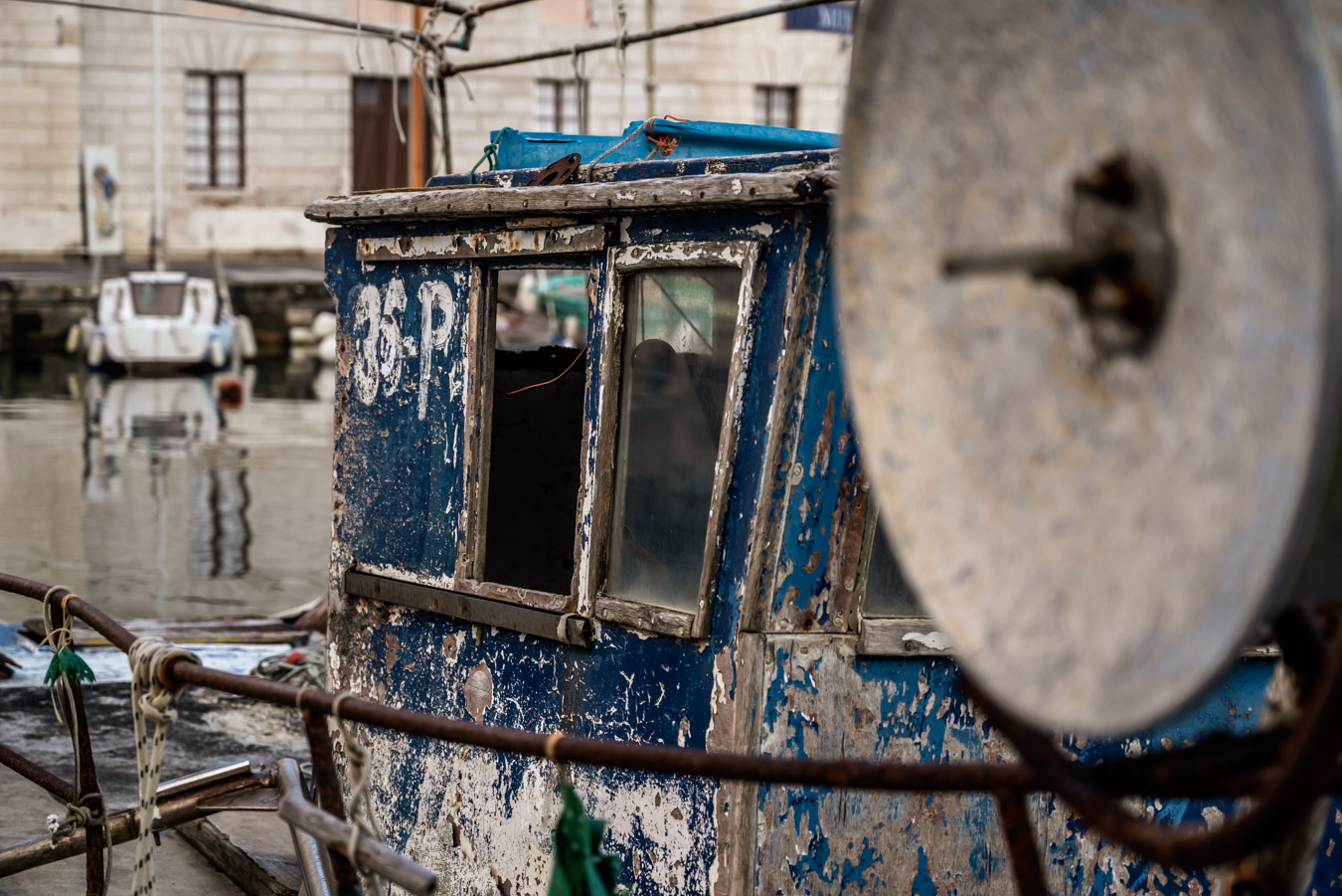 very old fishing boat in Piran